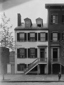 Exterior black and white photograph of the Surratt House, in Washington D.C.